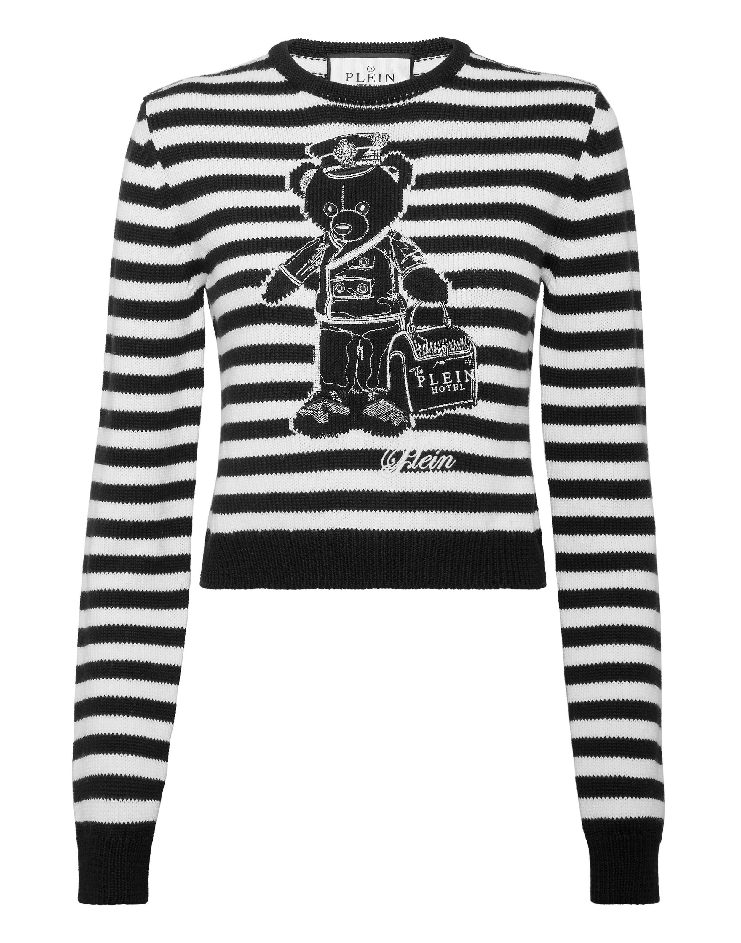 Pullover turtone a righe Pullover turtone a righe